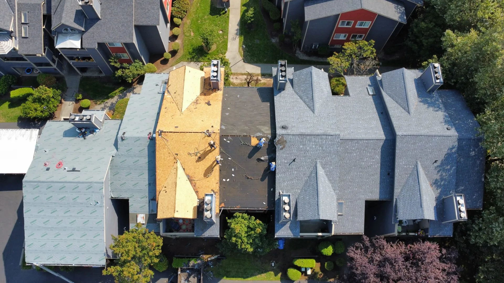 Aerial view of K Single Corp roofing project in progress